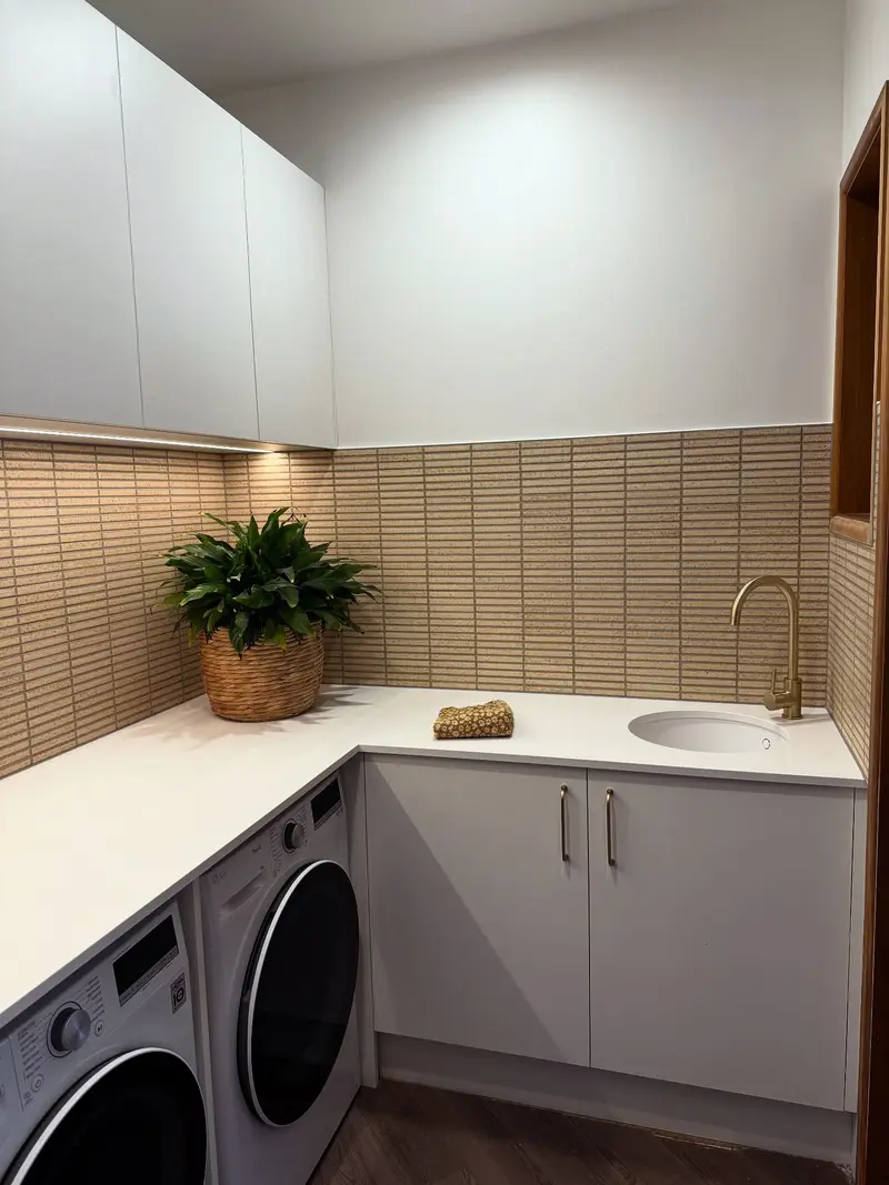 Laundry renovation with mosaic splashback